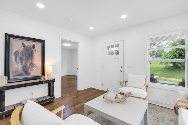 1104 Howell St, Hopkinsville, KY 42240 - living area with baseboards, recessed lighting, and wood finished floors