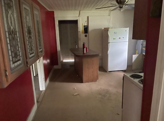 3442 E Cross St, Rives, TN 38253 - kitchen with white appliances, unfinished concrete floors, and ceiling fan