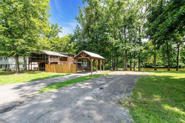 1353 Chapmansboro Rd, Chapmansboro, TN 37035 - view of front of house with a gazebo, brick siding, and asphalt driveway