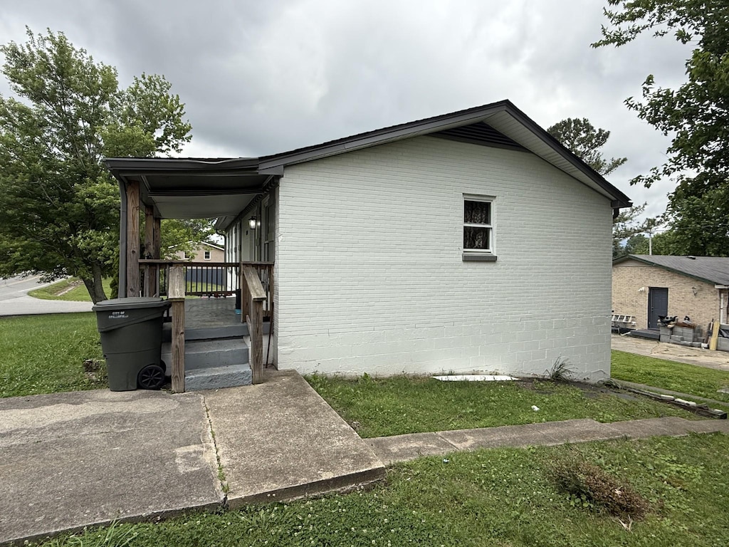 804 10th Ave E, Springfield, TN 37172 - view of home's exterior featuring a yard and brick siding