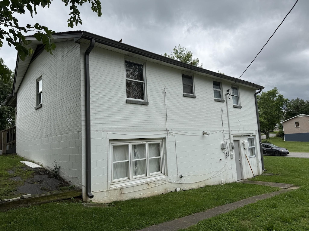 804 10th Ave E, Springfield, TN 37172 - rear view of house with brick siding and a lawn