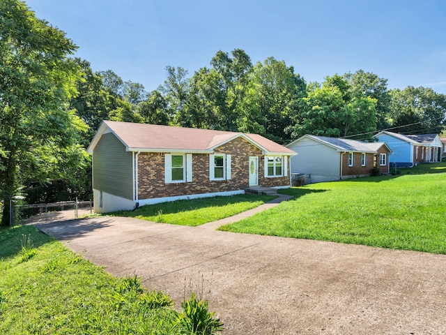503 Ginkgo Dr, Clarksville, TN 37042 - ranch-style home with brick siding and driveway