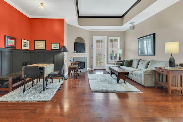 307 Seven Springs Way Unit 402, Brentwood, TN 37027 - living area with wood finished floors, crown molding, a fireplace, and a tray ceiling
