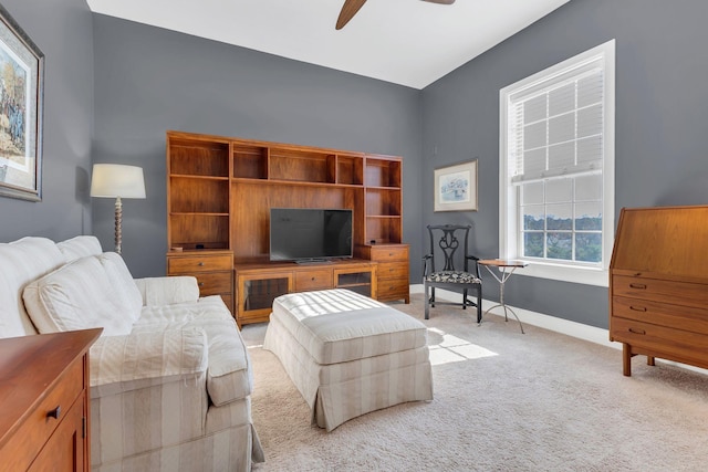 307 Seven Springs Way Unit 402, Brentwood, TN 37027 - living area with a ceiling fan, light colored carpet, and baseboards