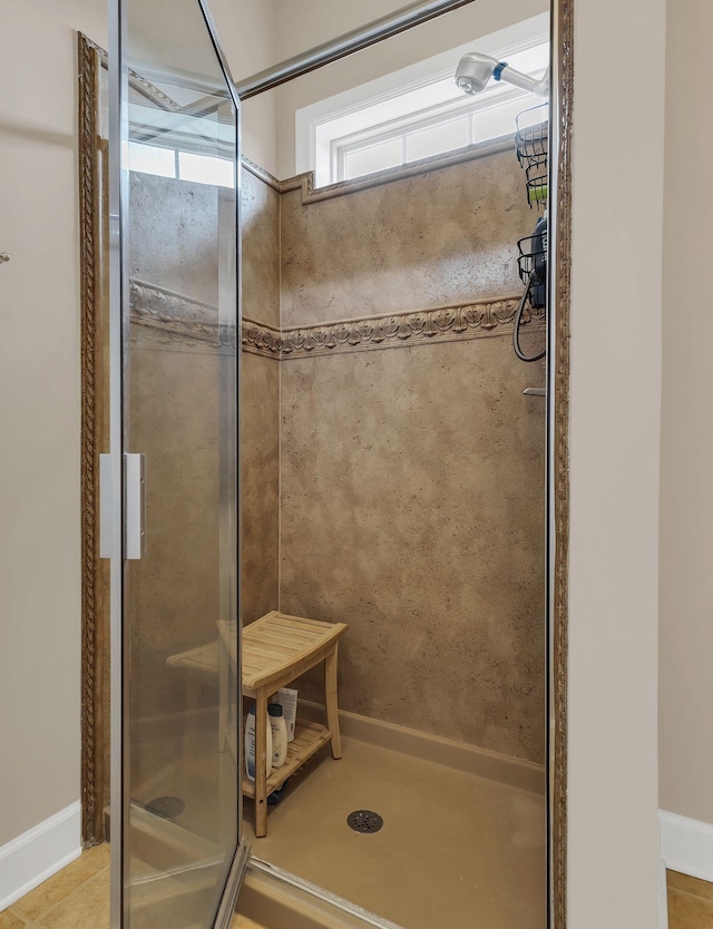 307 Seven Springs Way Unit 402, Brentwood, TN 37027 - bathroom with a shower stall and baseboards