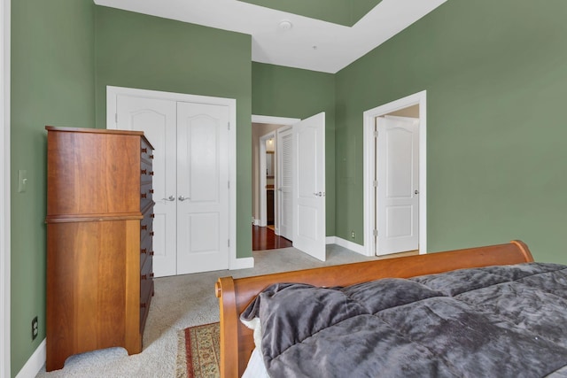 307 Seven Springs Way Unit 402, Brentwood, TN 37027 - bedroom featuring carpet floors, a closet, and baseboards