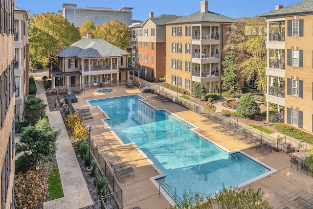 307 Seven Springs Way Unit 402, Brentwood, TN 37027 - community pool with a hot tub and a patio