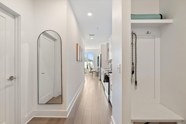 1041 E Trinity Ln Unit 419, Nashville, TN 37216 - hallway featuring light wood-style flooring, recessed lighting, and baseboards