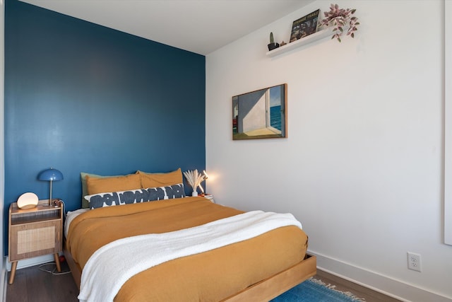 1041 E Trinity Ln Unit 419, Nashville, TN 37216 - bedroom featuring wood finished floors and baseboards