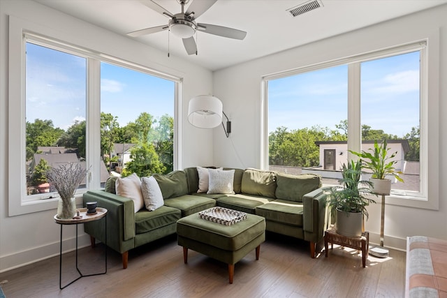 1041 E Trinity Ln Unit 419, Nashville, TN 37216 - living room with plenty of natural light, a ceiling fan, wood finished floors, and baseboards