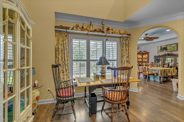 1552 Charleston Blvd, Murfreesboro, TN 37130 - dining area with crown molding, wood finished floors, arched walkways, baseboards, and ceiling fan