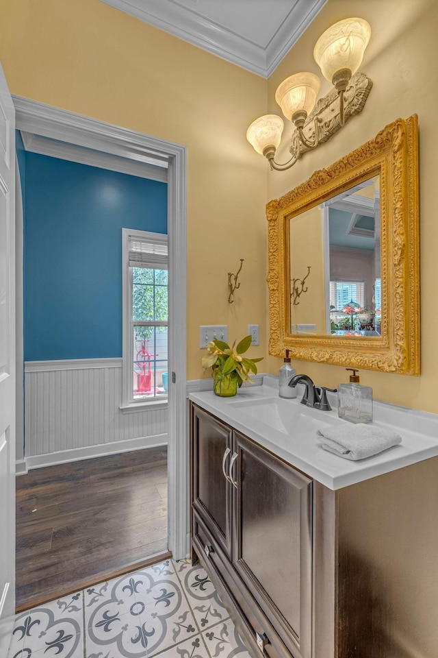 1552 Charleston Blvd, Murfreesboro, TN 37130 - bathroom featuring ornamental molding, a wainscoted wall, vanity, and wood finished floors