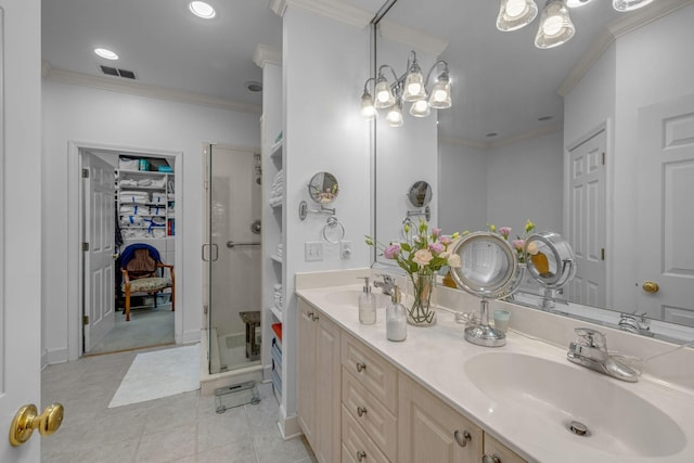 1552 Charleston Blvd, Murfreesboro, TN 37130 - bathroom with crown molding, a shower stall, double vanity, a walk in closet, and tile patterned floors