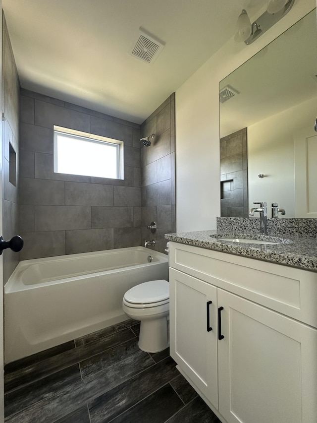 218 Myatt Dr Unit C, Madison, TN 37115 - full bathroom with  shower combination, toilet, vanity, and wood finished floors