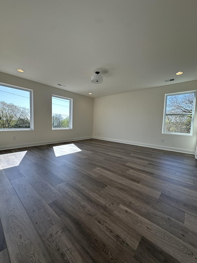 218 Myatt Dr Unit C, Madison, TN 37115 - unfurnished room featuring baseboards, dark wood-style flooring, and recessed lighting