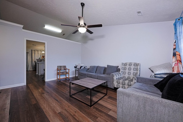 534 Mckean Dr, Smyrna, TN 37167 - living area with wood finished floors, ceiling fan, lofted ceiling, baseboards, and a textured ceiling
