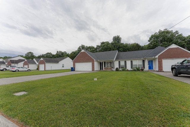 534 Mckean Dr, Smyrna, TN 37167 - ranch-style house with concrete driveway, an attached garage, a front lawn, and brick siding