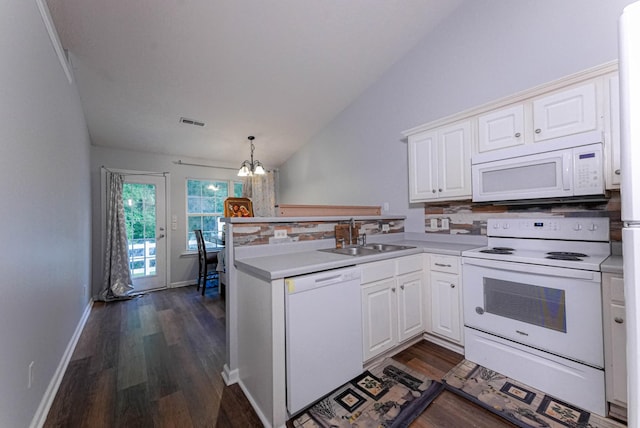 534 Mckean Dr, Smyrna, TN 37167 - kitchen featuring white appliances, vaulted ceiling, a sink, a peninsula, and dark wood-type flooring