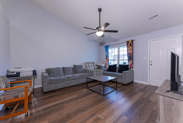 534 Mckean Dr, Smyrna, TN 37167 - living room featuring vaulted ceiling, dark wood-style floors, ceiling fan, and baseboards