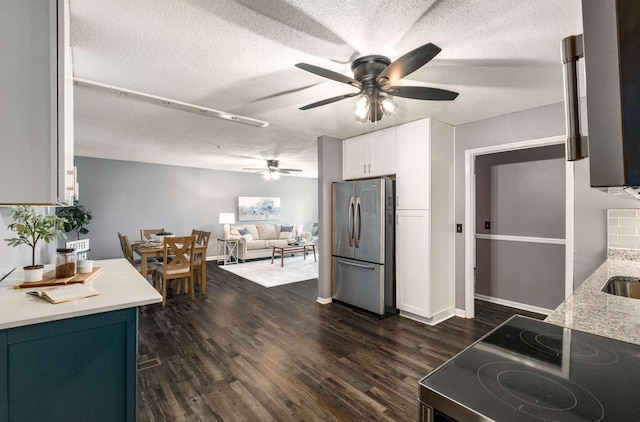 4706 Barfield Crescent Rd, Murfreesboro, TN 37128 - kitchen featuring freestanding refrigerator, a ceiling fan, white cabinetry, dark wood-type flooring, and a textured ceiling