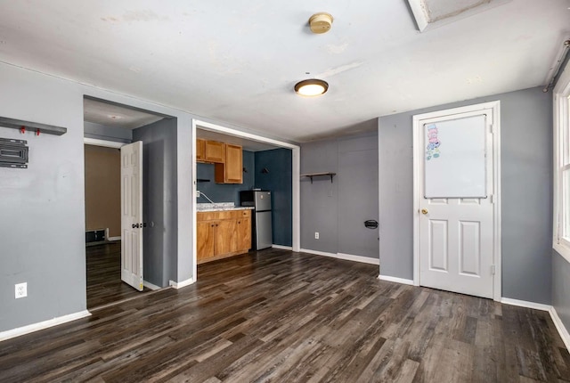 4706 Barfield Crescent Rd, Murfreesboro, TN 37128 - kitchen with dark wood-style floors, baseboards, freestanding refrigerator, brown cabinetry, and light countertops