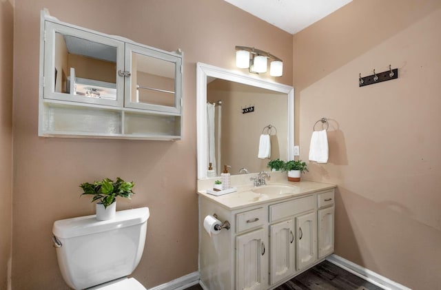 4706 Barfield Crescent Rd, Murfreesboro, TN 37128 - bathroom with toilet, vanity, baseboards, and wood finished floors