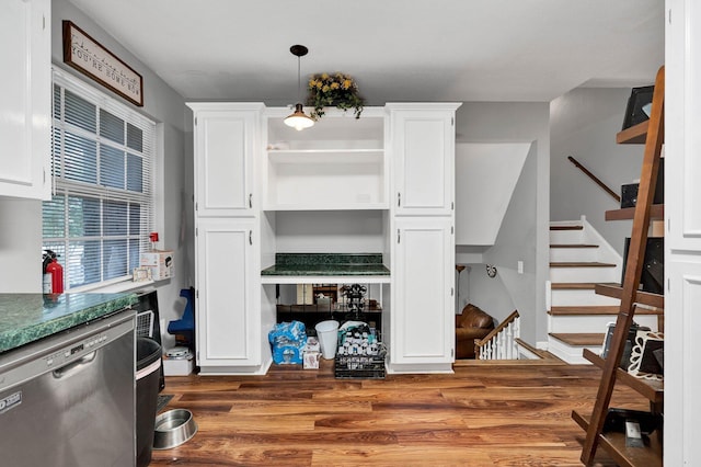 4028 Tomahawk Cir NW, Cleveland, TN 37312 - kitchen with stainless steel dishwasher, wood finished floors, white cabinets, open shelves, and pendant lighting