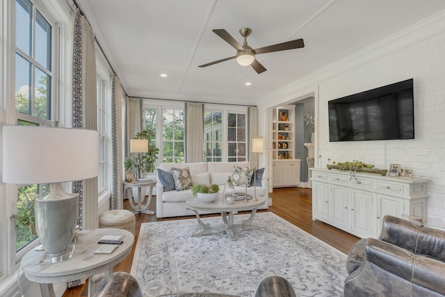 3630 Bear Creek Ln, Thompsons Station, TN 37179 - living area with a ceiling fan, dark wood-style flooring, and ornamental molding