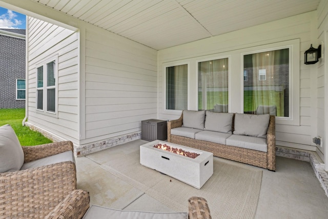 1705 Merkel Rd, Columbia, TN 38401 - view of patio with an outdoor living space with a fire pit