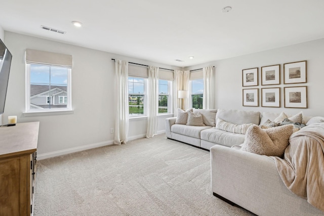 1705 Merkel Rd, Columbia, TN 38401 - living area with healthy amount of natural light, baseboards, and light colored carpet