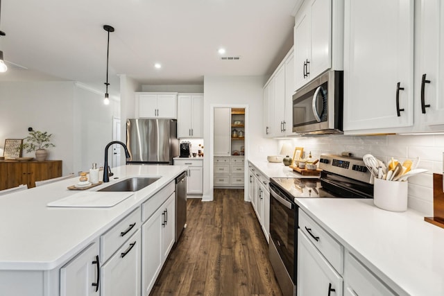 1705 Merkel Rd, Columbia, TN 38401 - kitchen with appliances with stainless steel finishes, a sink, tasteful backsplash, light countertops, and recessed lighting