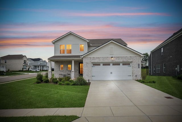 1705 Merkel Rd, Columbia, TN 38401 - view of front facade featuring a front yard, driveway, and brick siding