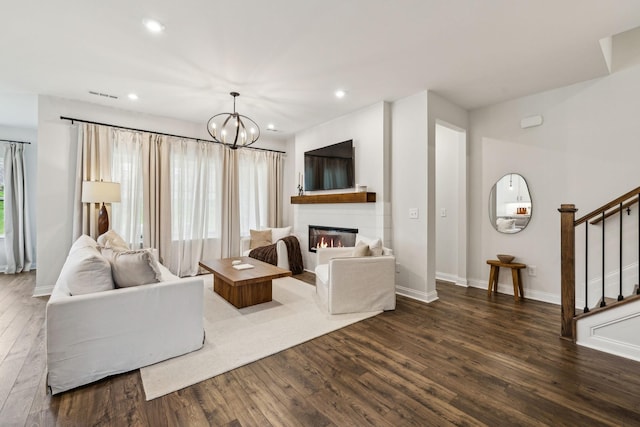 1705 Merkel Rd, Columbia, TN 38401 - living area with dark wood-type flooring, stairs, recessed lighting, a glass covered fireplace, and baseboards