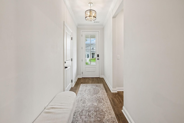 1705 Merkel Rd, Columbia, TN 38401 - entryway featuring dark wood-type flooring, a chandelier, crown molding, and baseboards