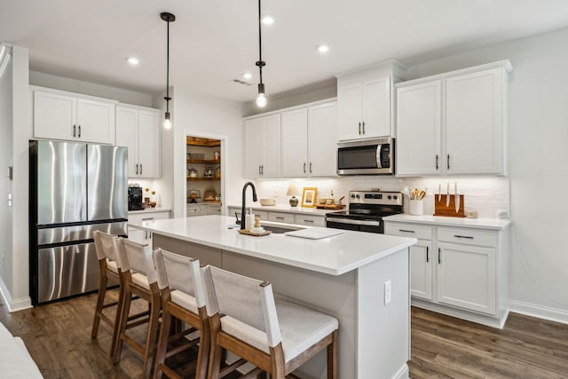 1705 Merkel Rd, Columbia, TN 38401 - kitchen featuring stainless steel appliances, a sink, tasteful backsplash, an island with sink, and recessed lighting