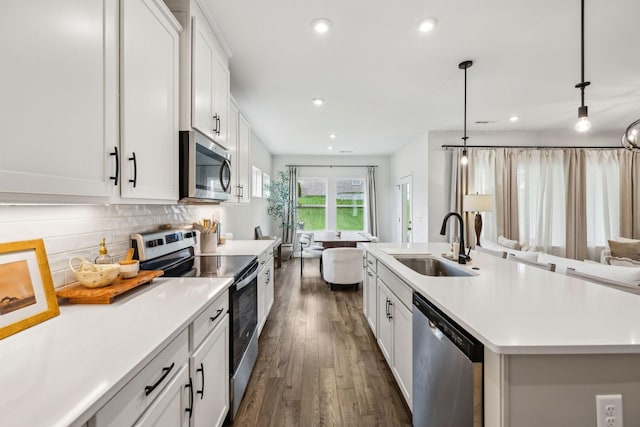 1705 Merkel Rd, Columbia, TN 38401 - kitchen featuring open floor plan, stainless steel appliances, a sink, recessed lighting, and dark wood-type flooring