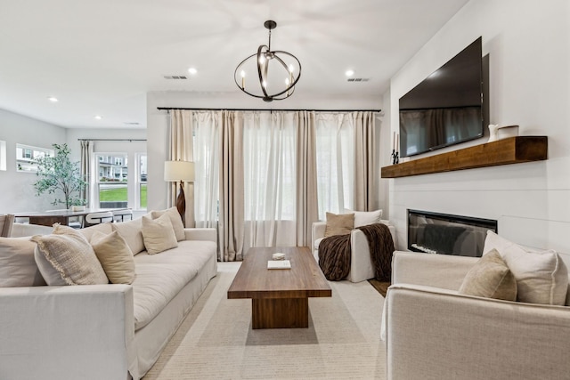 1705 Merkel Rd, Columbia, TN 38401 - living area featuring a chandelier, recessed lighting, and a glass covered fireplace
