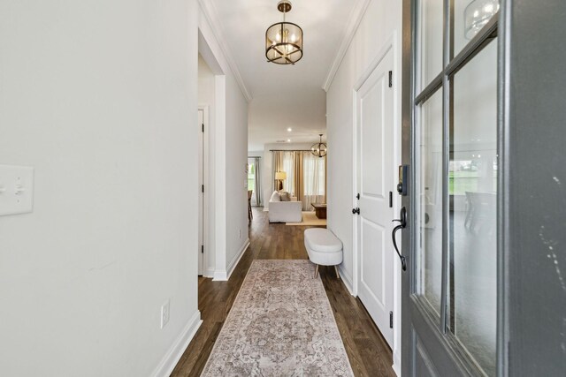 1705 Merkel Rd, Columbia, TN 38401 - foyer entrance featuring a chandelier, dark wood-type flooring, ornamental molding, and baseboards