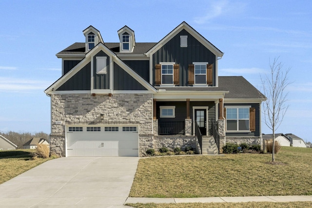 7209 Richvale Dr, Fairview, TN 37062 - craftsman inspired home with board and batten siding, an attached garage, a front lawn, stone siding, and driveway