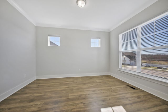 7209 Richvale Dr, Fairview, TN 37062 - empty room with crown molding, baseboards, and dark wood-style floors