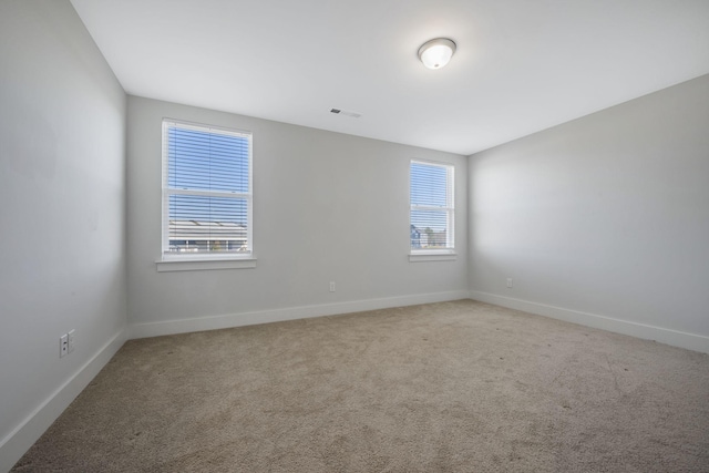 7209 Richvale Dr, Fairview, TN 37062 - carpeted empty room featuring plenty of natural light and baseboards