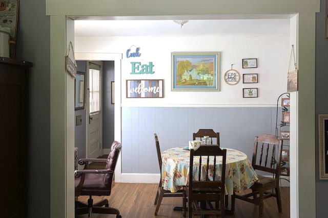 3281 Pulaski Hwy, Lawrenceburg, TN 38464 - dining space with wood finished floors, a wainscoted wall, and baseboards
