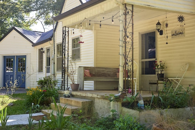 3281 Pulaski Hwy, Lawrenceburg, TN 38464 - property entrance featuring covered porch and metal roof
