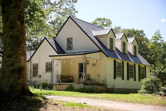 3281 Pulaski Hwy, Lawrenceburg, TN 38464 - view of front facade featuring metal roof, a porch, and a standing seam roof