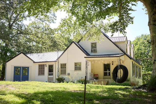 3281 Pulaski Hwy, Lawrenceburg, TN 38464 - view of front of home featuring metal roof and a front yard