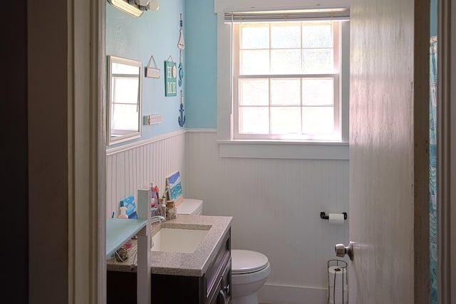 3281 Pulaski Hwy, Lawrenceburg, TN 38464 - full bathroom with toilet, a wainscoted wall, and vanity