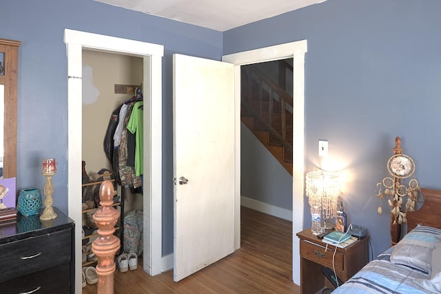 3281 Pulaski Hwy, Lawrenceburg, TN 38464 - bedroom featuring wood finished floors, a closet, and baseboards