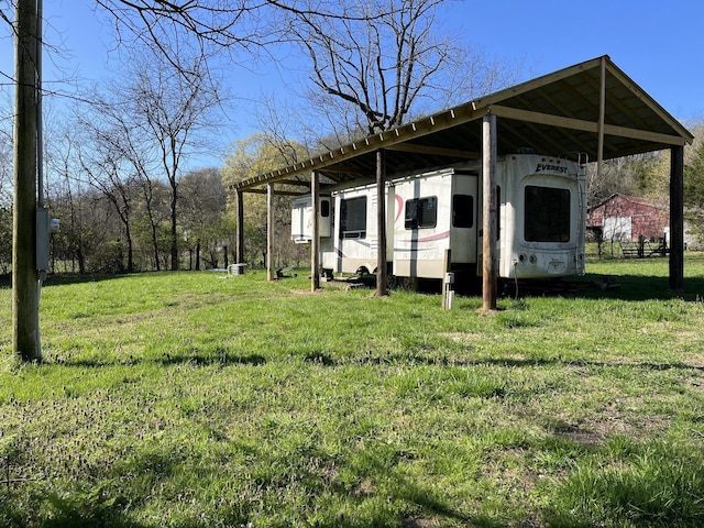 2001 Scotty Parker Rd, Gallatin, TN 37066 - view of property exterior featuring a yard and a carport