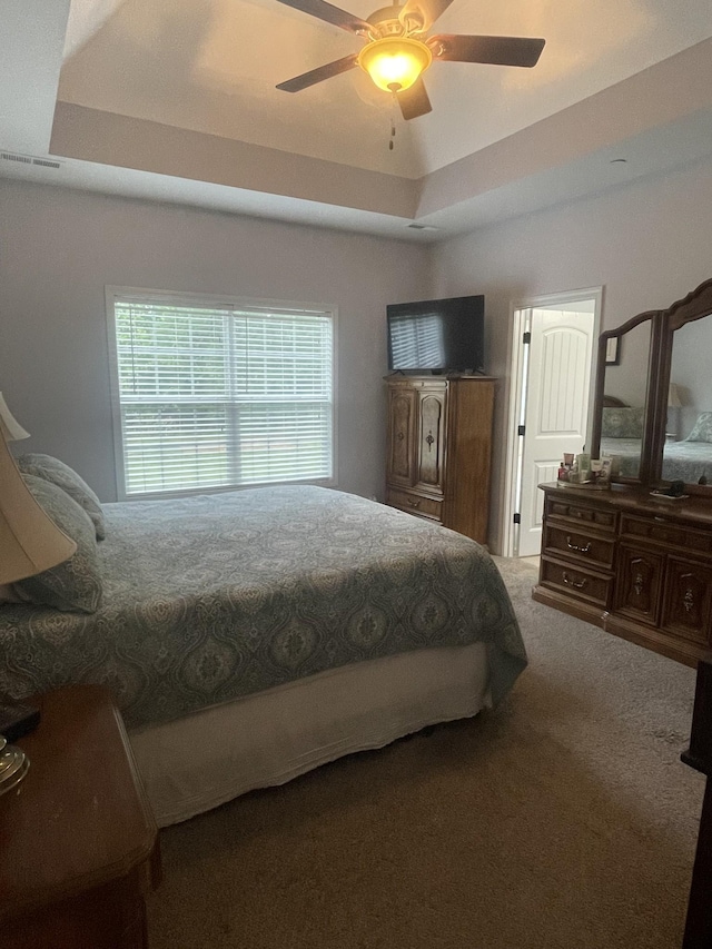 380 Preakness Cir, Pleasant View, TN 37146 - bedroom featuring carpet flooring, a ceiling fan, and a raised ceiling