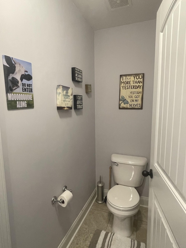 380 Preakness Cir, Pleasant View, TN 37146 - bathroom with baseboards, toilet, and tile patterned floors